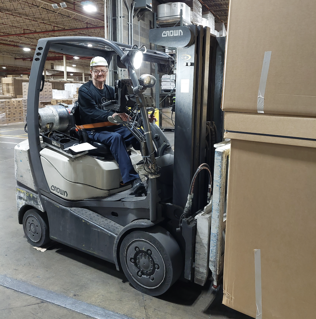 Lester McGowan driving forklift